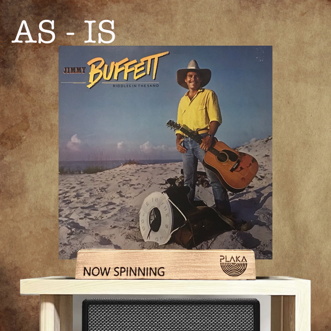 Jimmy Buffett- Riddles in the Sand